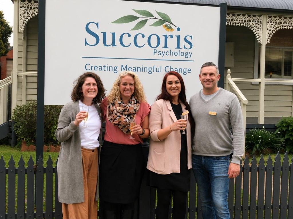 Members of the Succoris team celebrating outside the Succoris Bendigo clinic